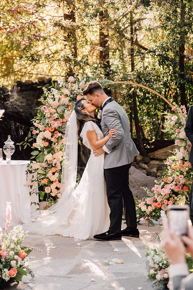 bride and groom kiss