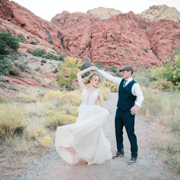 bride and groom in desert