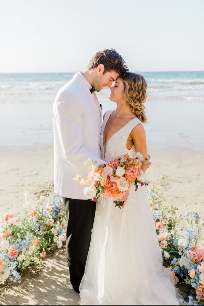 bride and groom on beach